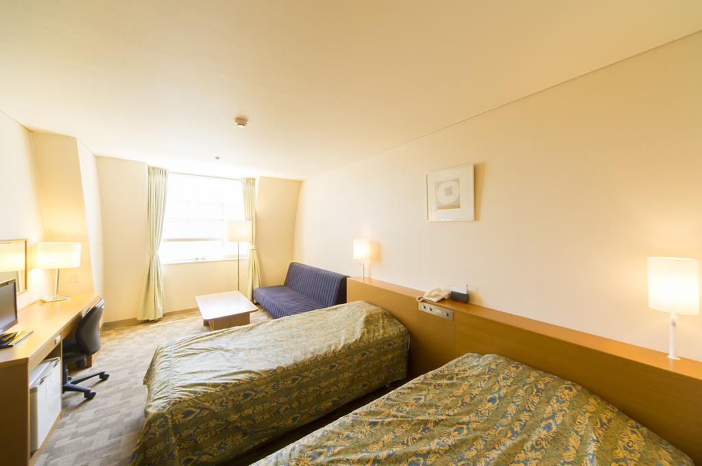 Hotel Hiroshima Sunplaza Quarto foto